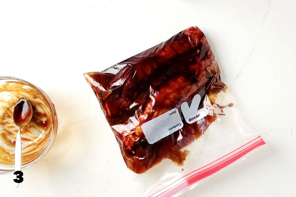 plastic bag filled with pork and char siu sauce