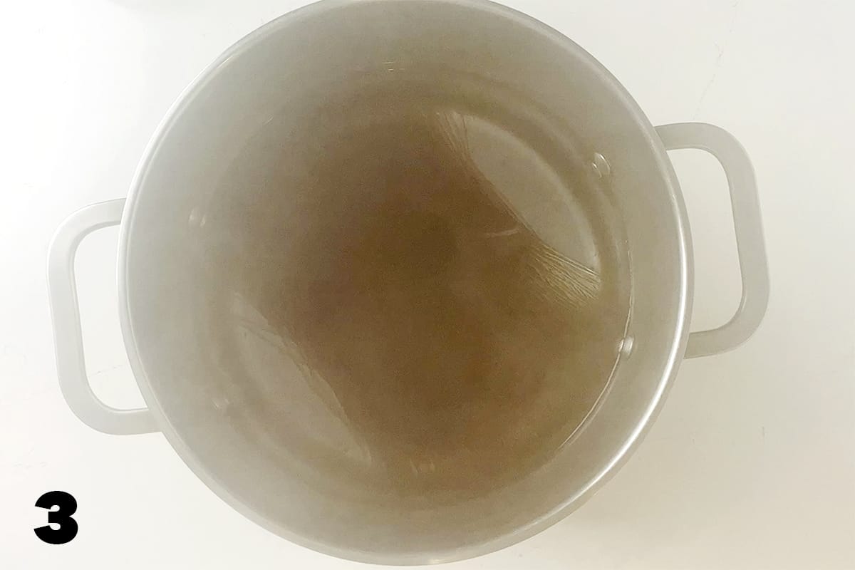 noodles cooking in stockpot with lots of steam