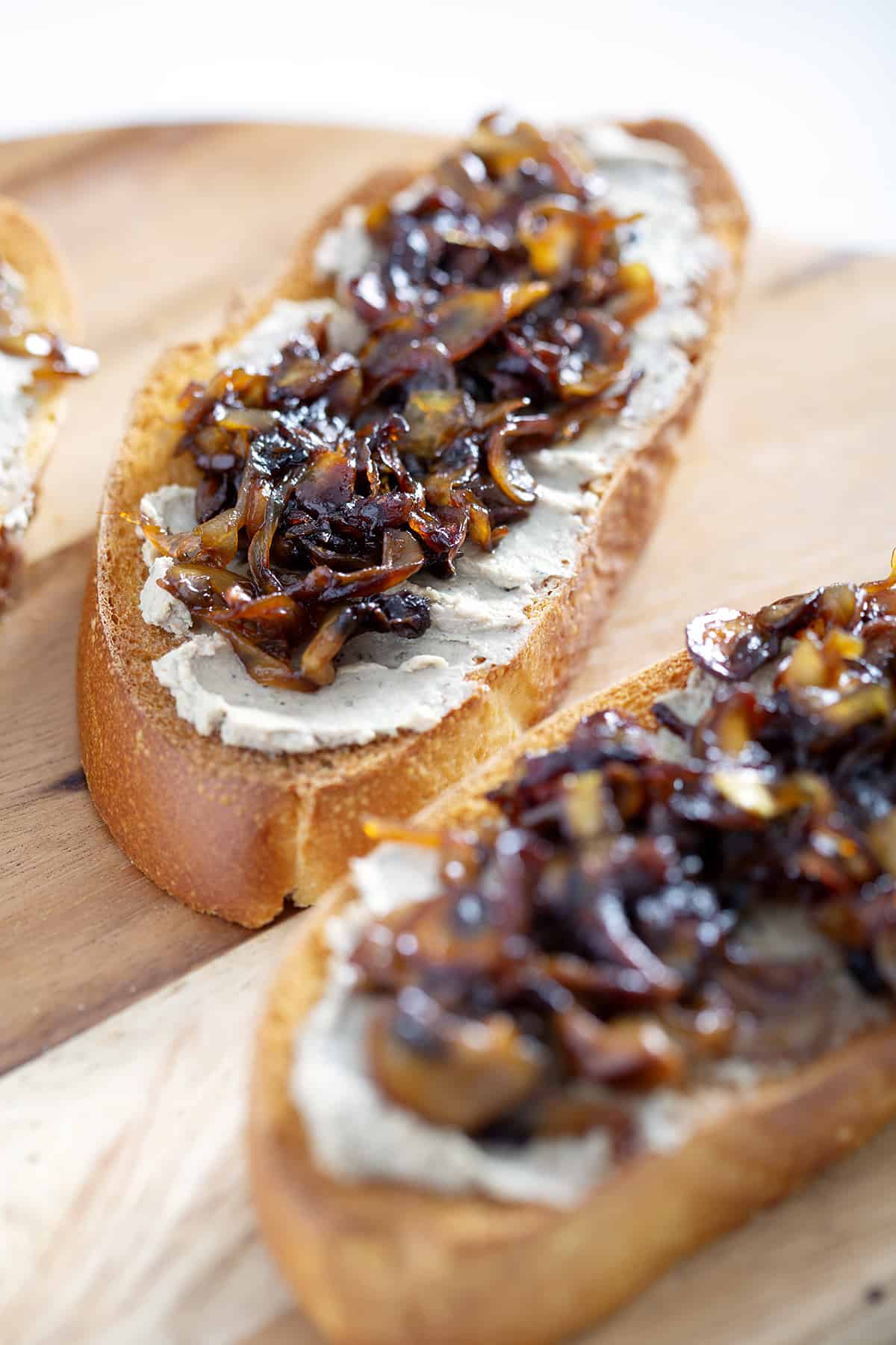 toast with pate and caramelized onions and mushrooms on top