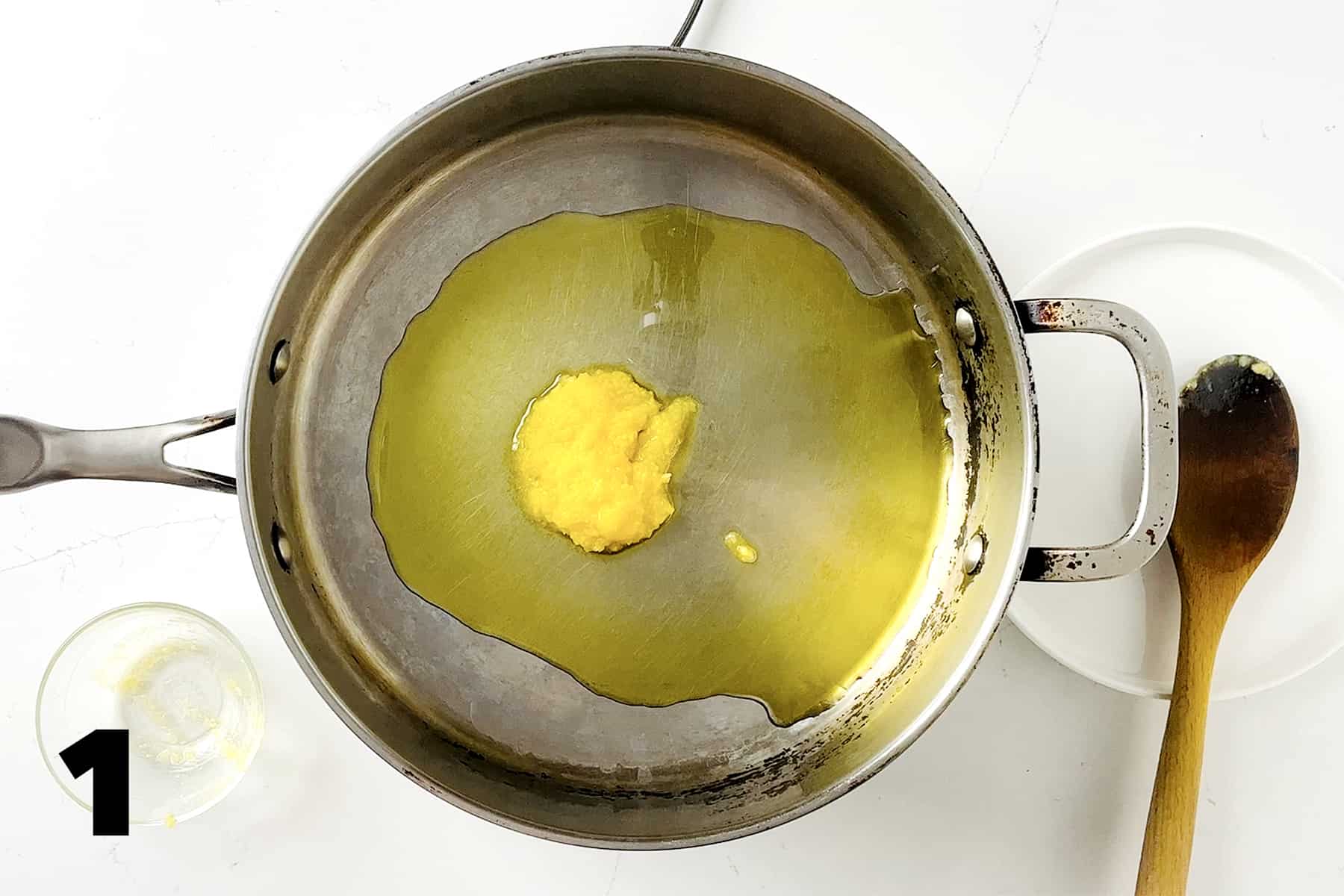 frying pan with olive oil and ghee