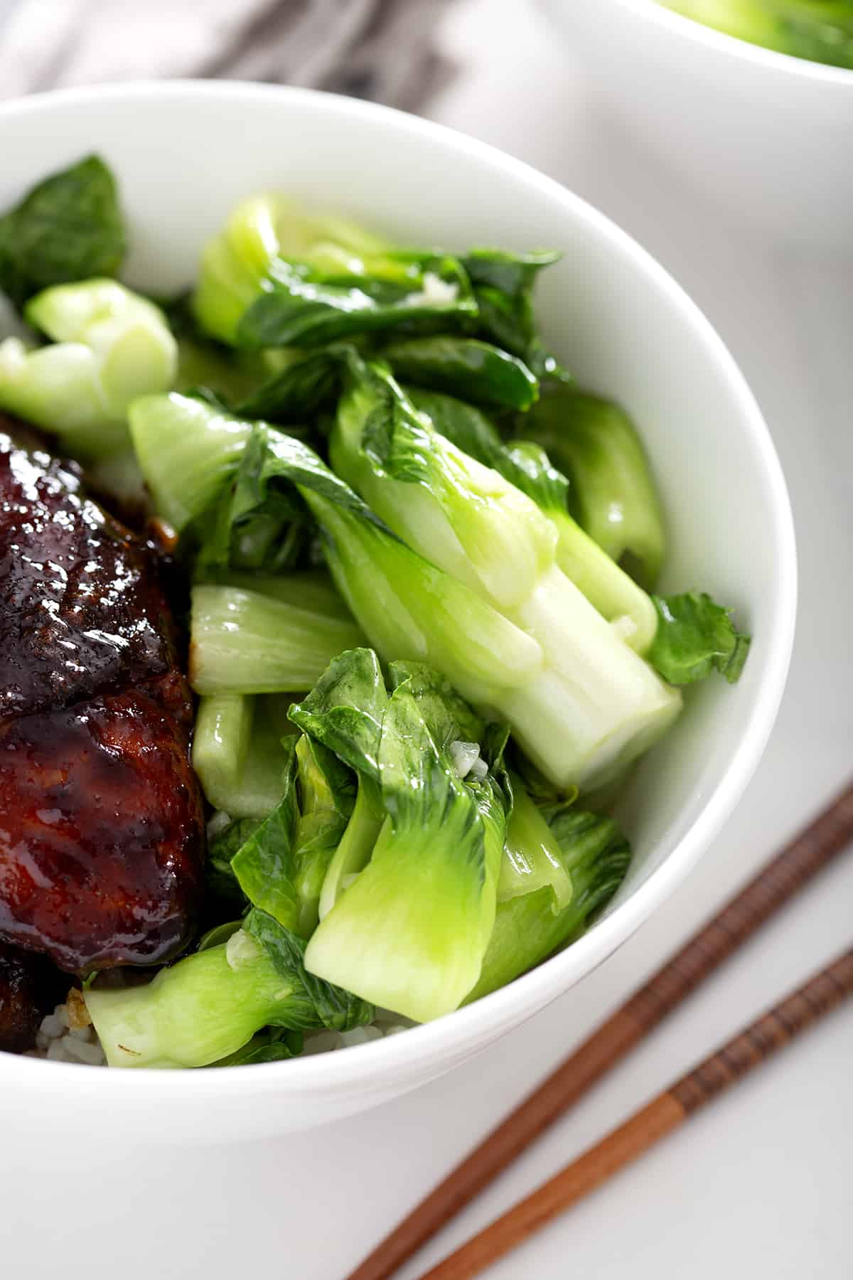 close up of bowl of shanghai bok choy with garlic