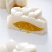 close up of fruit jelly mooncake cut in half