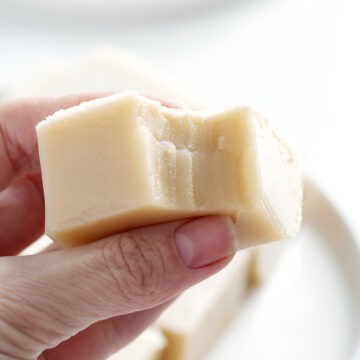 hand holding piece of Chinese coconut pudding
