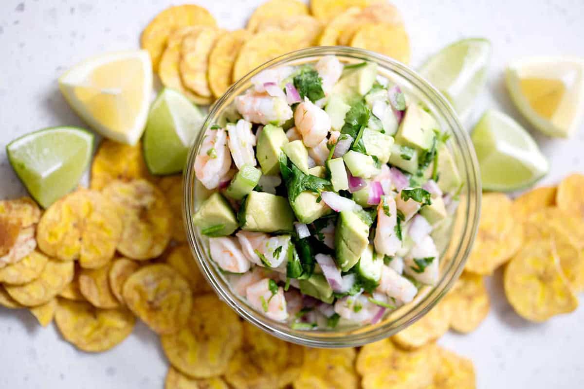 bowl of shrimp ceviche surrounded by plantain chips